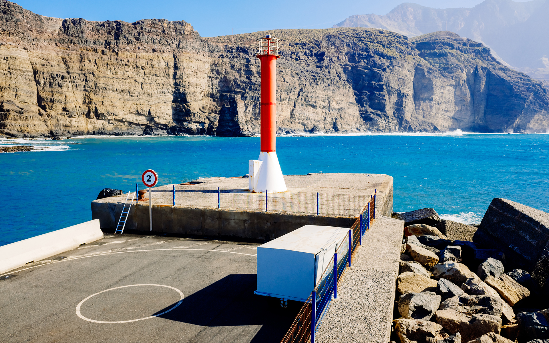 Entrance to the mouth of the port of Agaete with the beautiful c